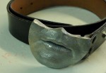 Finished Buckle in hard urethane with aluminum finish.